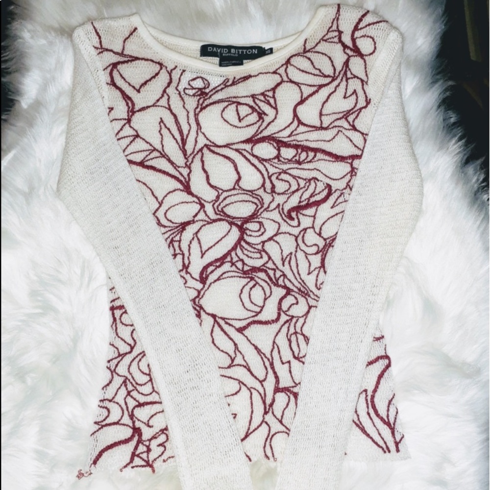 Sheer top with red design